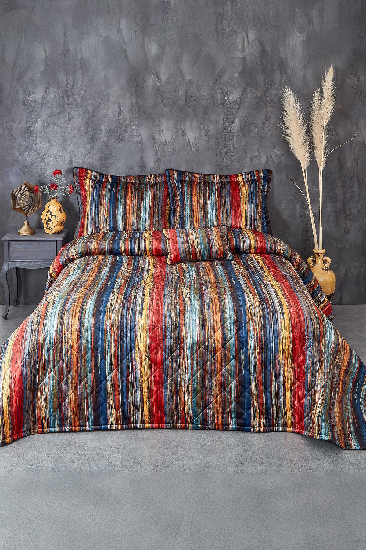 Colorful striped double bedspread and pillow set in a modern bedroom