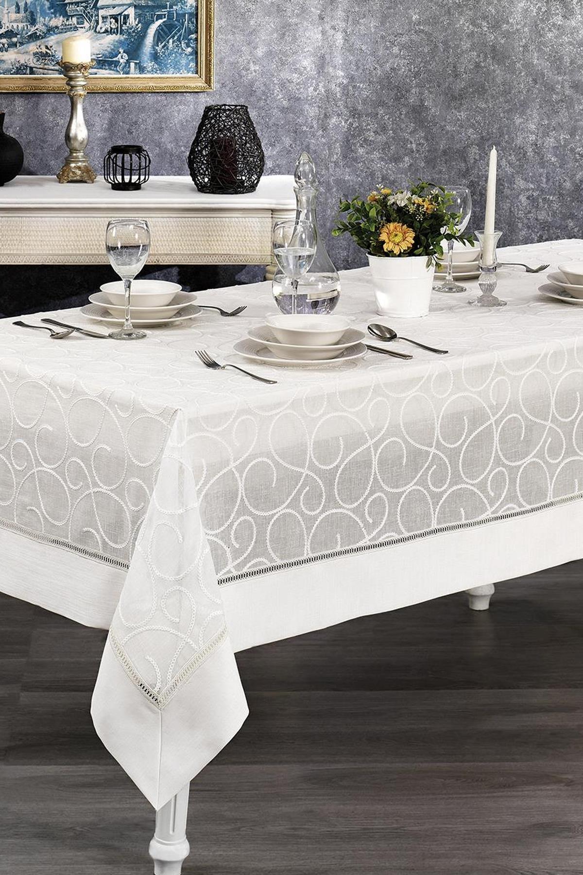 Stain-resistant, wrinkle-free white tablecloth on a modern, stylish table setting