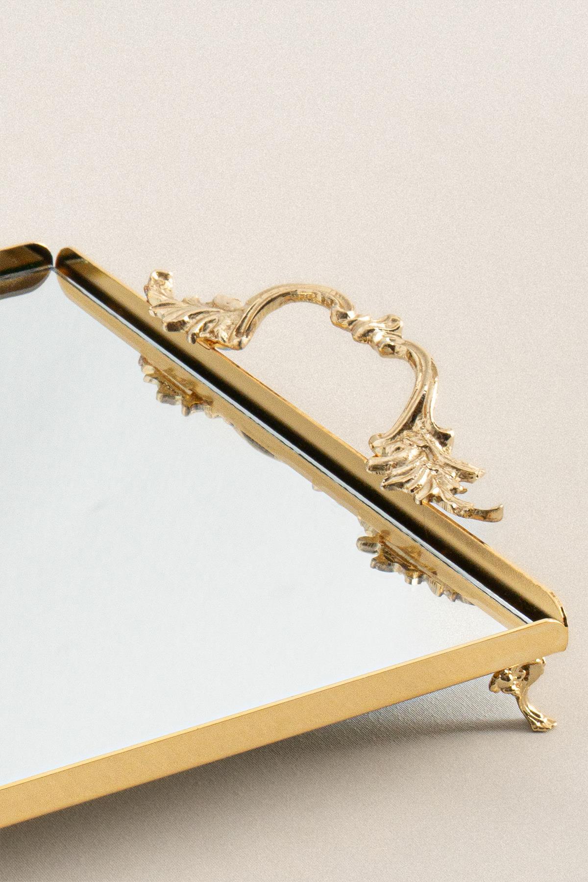 Large rectangular gold-colored tray with elegant handles, mirrored surface, decorative serving tray