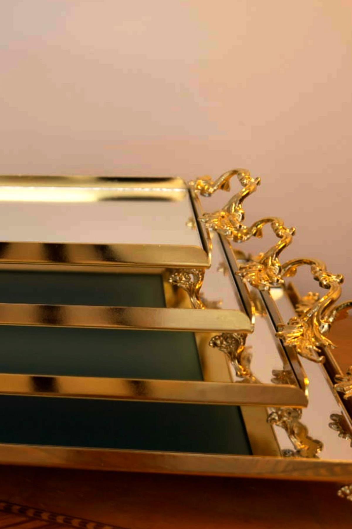 Small rectangular tray with elegant gold-colored handles, ideal for decorative and stylish presentations