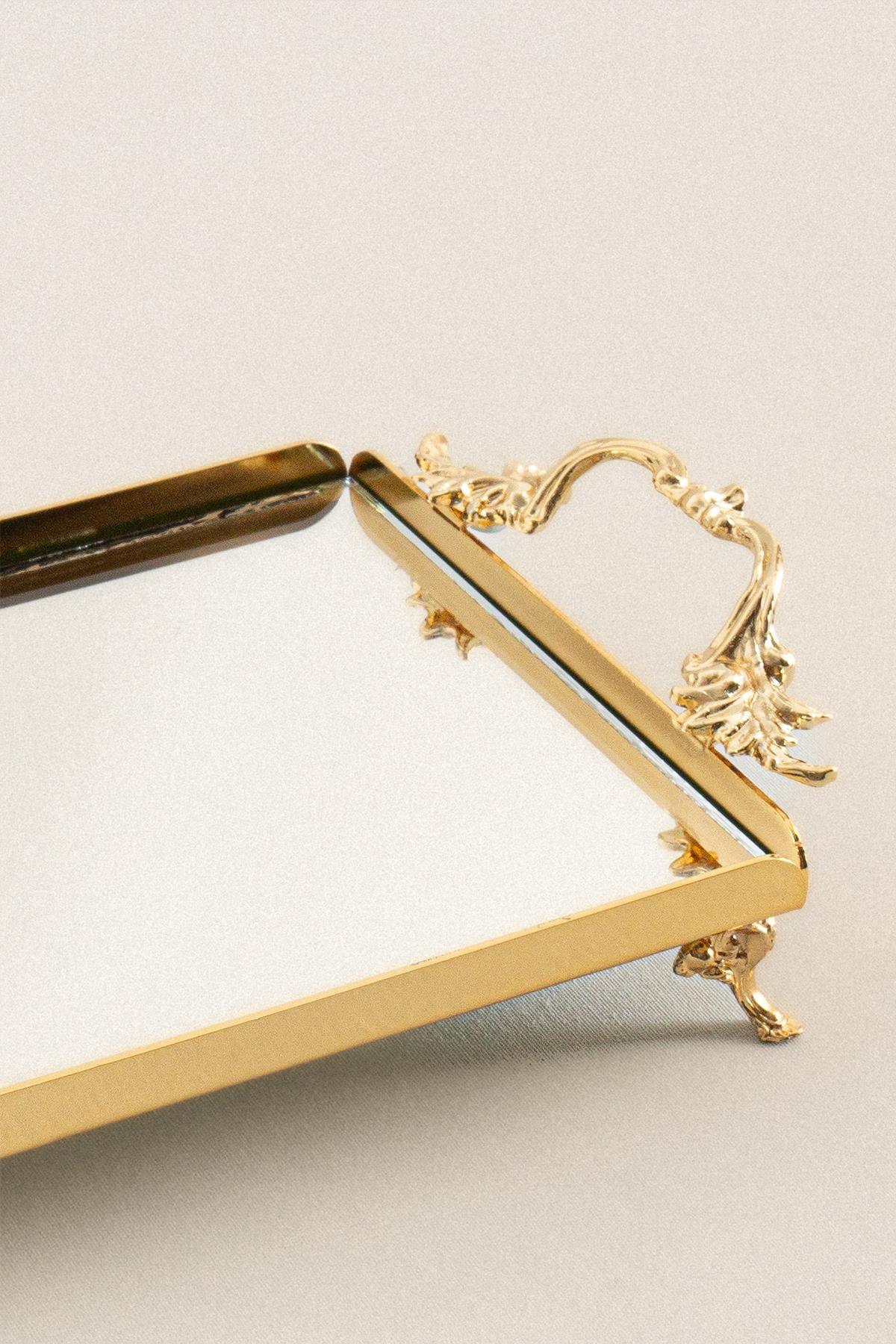 Gold-colored mini tray with elegant handles, rectangular with a mirrored surface
