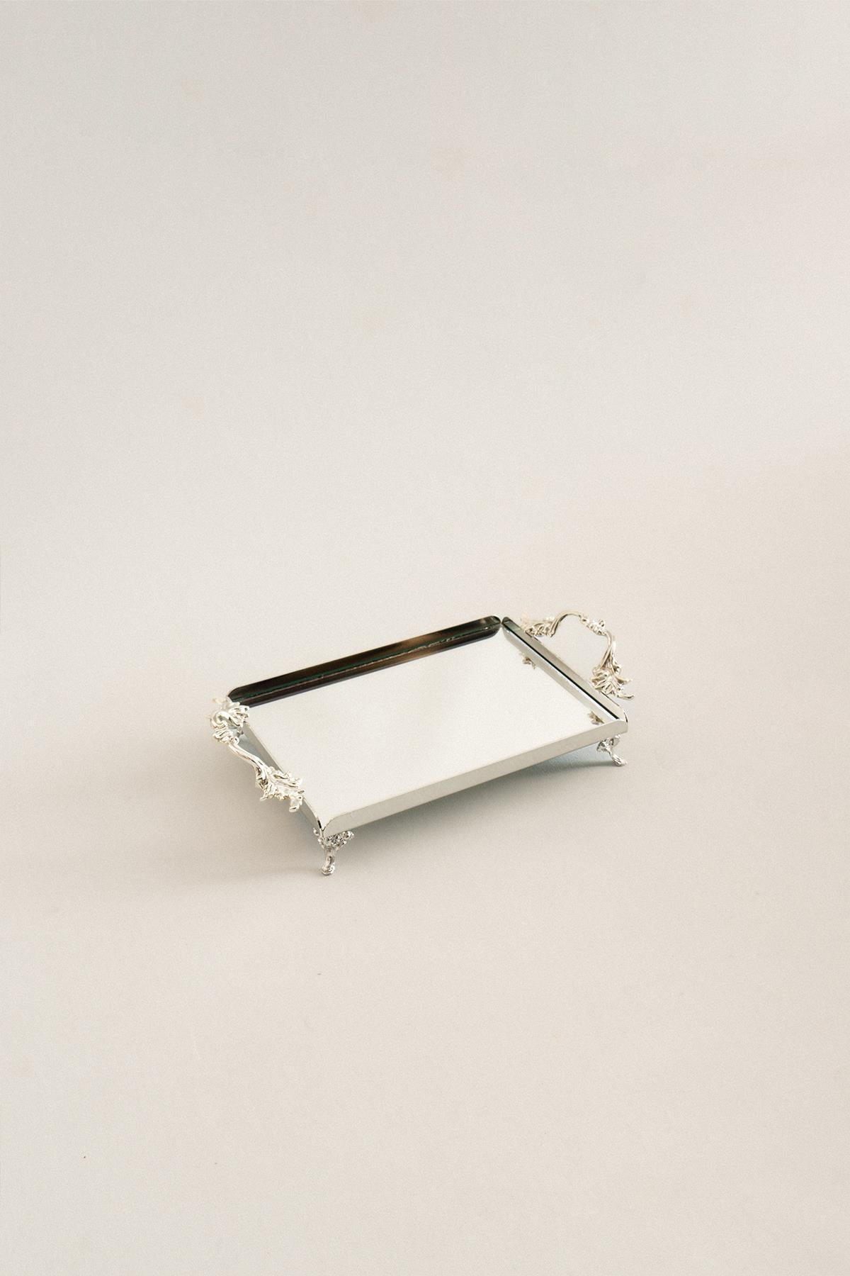 Elegant silver mini tray with handles and feet, rectangular and minimalist design