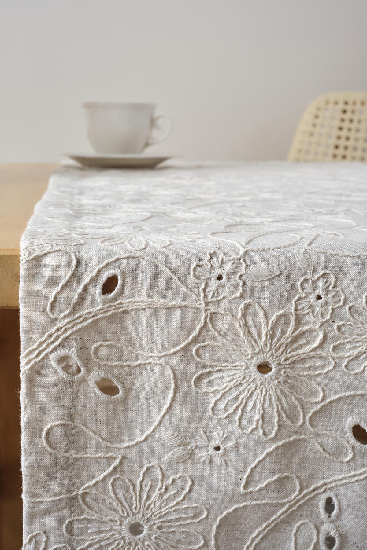 Cream-colored embroidered table runner, floral pattern, modern table decor