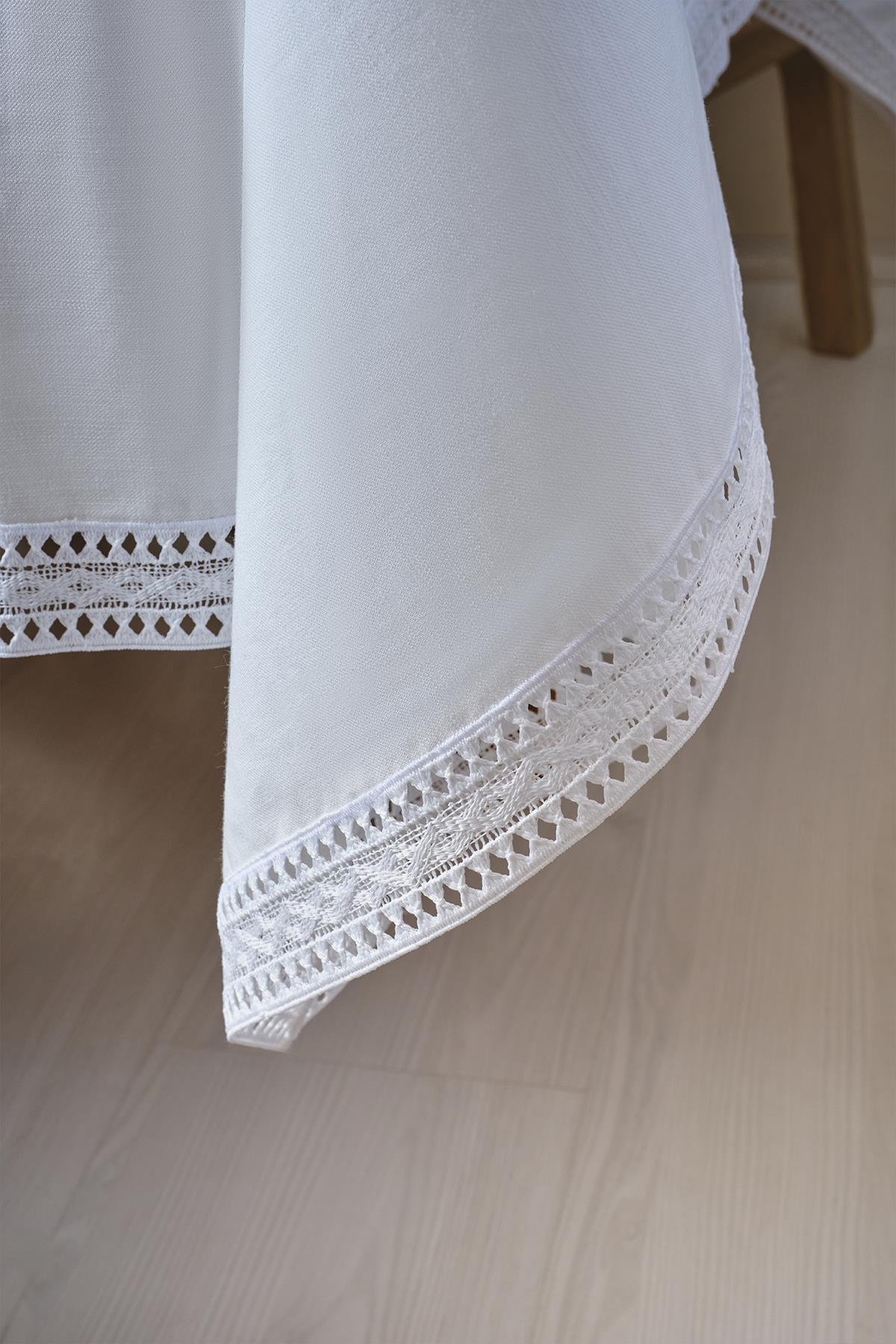 White tablecloth with lace detail, modern and stylish table decor
