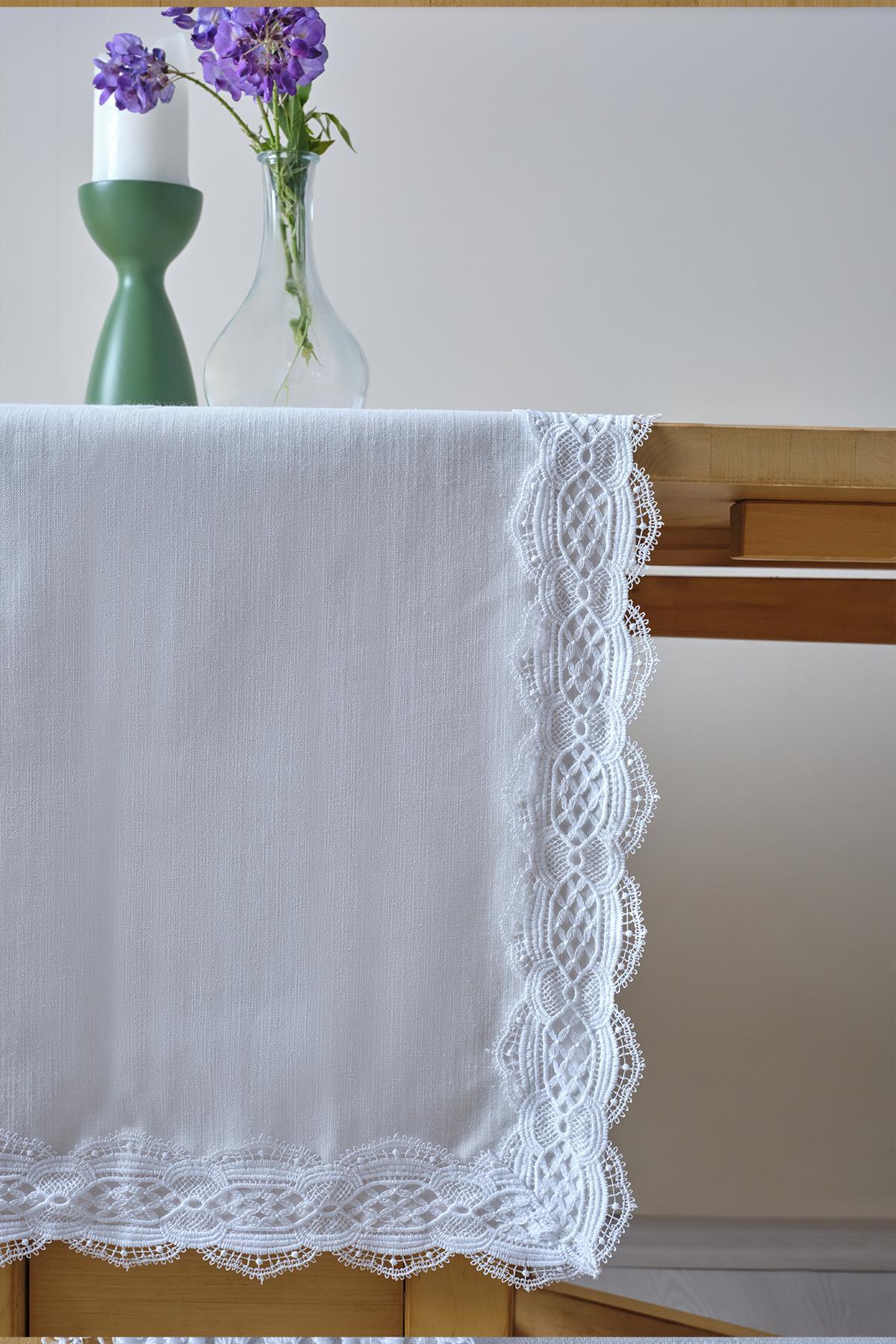 White table runner with lace edges, stylish minimal tabletop decor, featuring flower and candle details