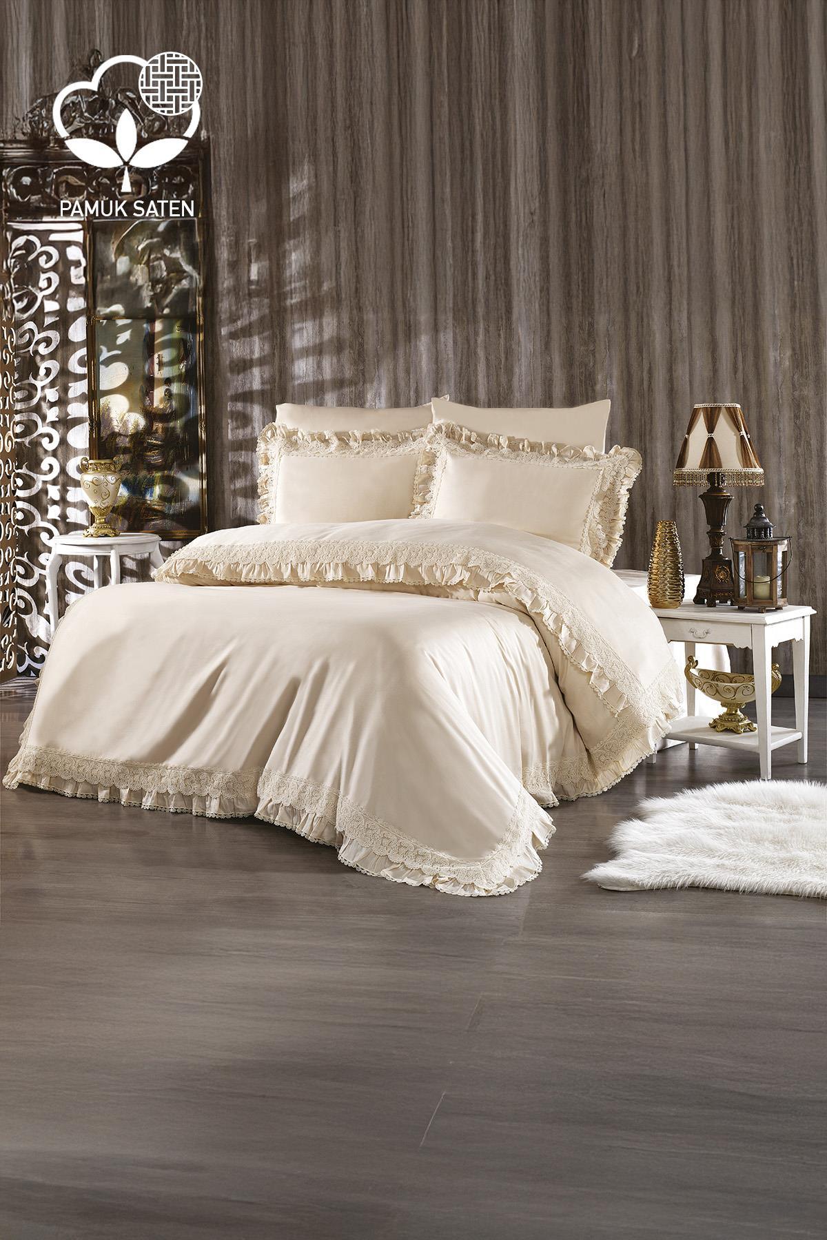 Cream-colored lace organic cotton sateen double duvet cover set in a modern bedroom