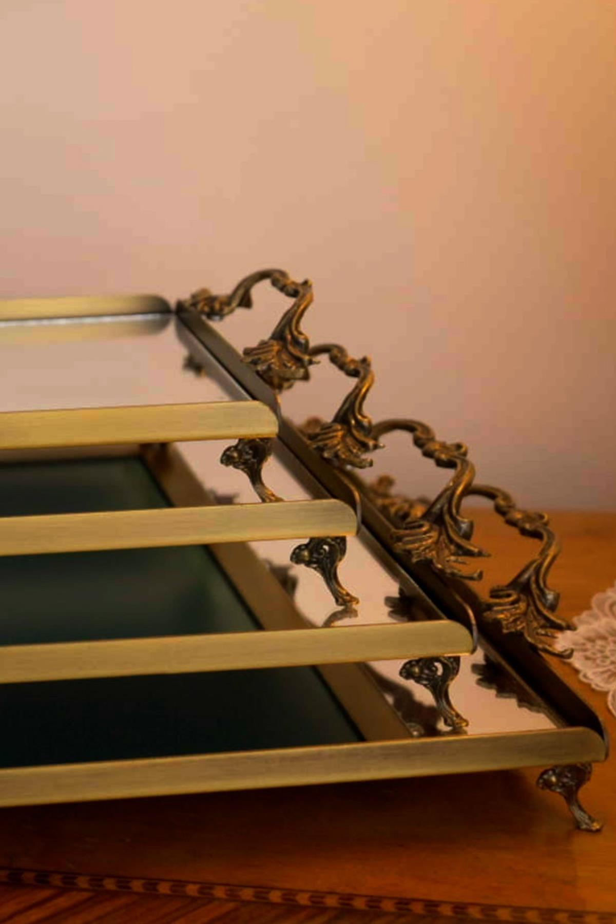 Rectangular mirrored tray with distressed handles and metal legs, classic decorative design