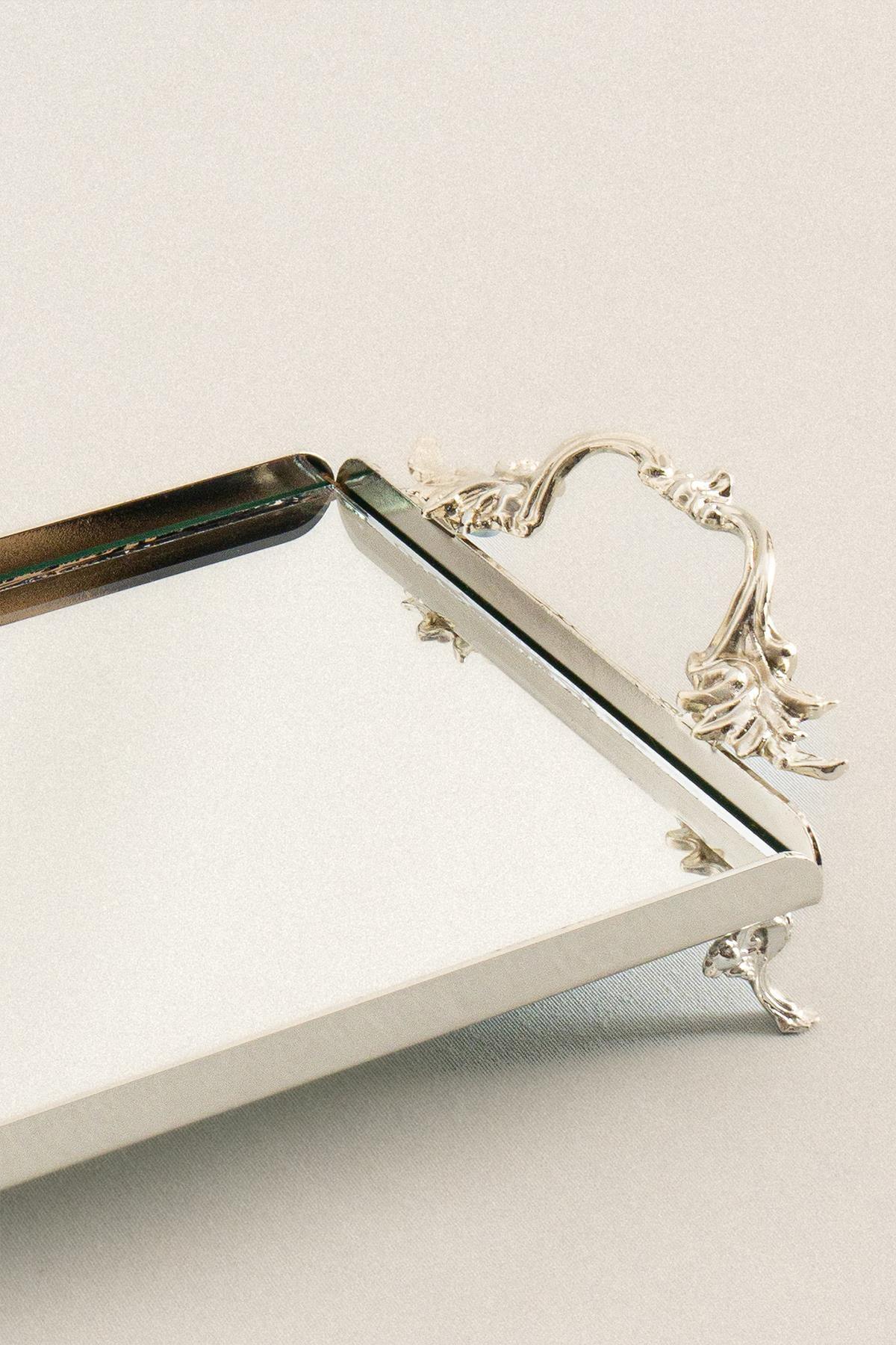 Mini silver tray with elegant handles, rectangular, decorative footed design