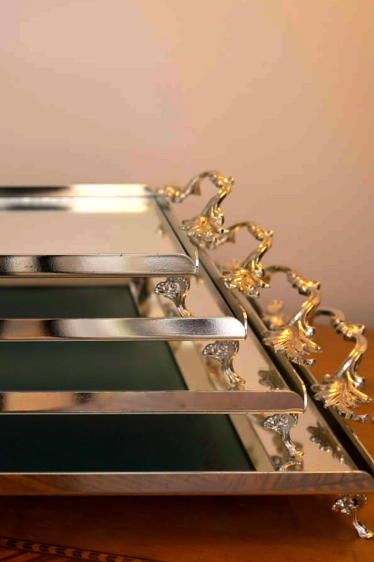 Classic silver centerpiece tray with elegant handles and pedestal base, decorative serving tray